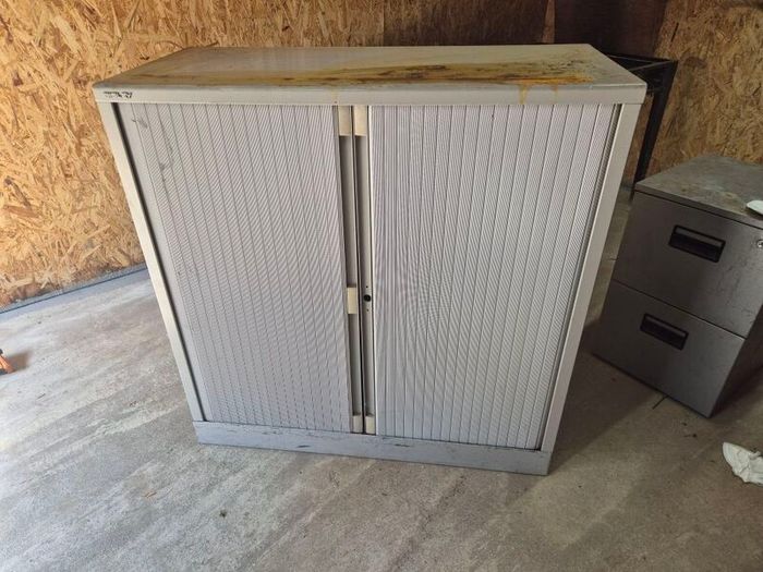 Roll door shelf unit