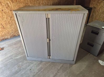 Roll door shelf unit