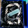 Freshwater pearl necklace and bracelet for sale. New, in original boxes. Image 3
