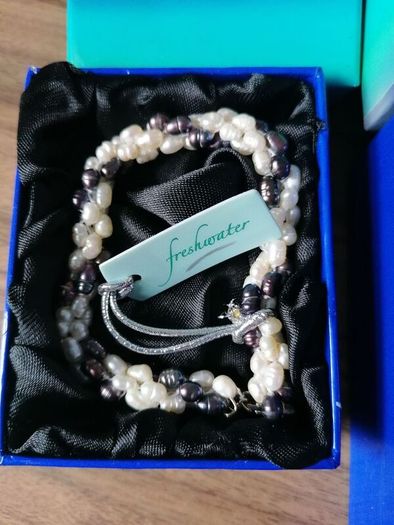 Freshwater pearl necklace and bracelet for sale. New, in original boxes.