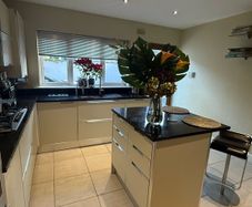 Scavolini kitchen units and Island with granite
