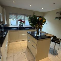 Scavolini kitchen units and Island with granite