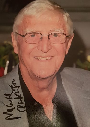 A signed michael Parkinson photo