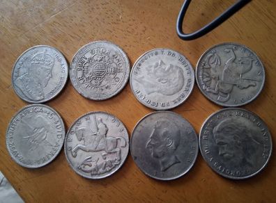 8 various Movie Prop Coins