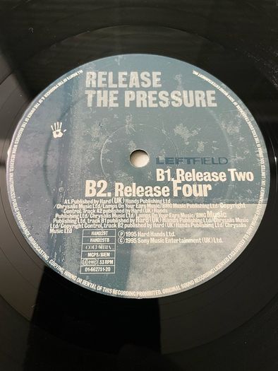 Leftfield - Release The Pressure - 12" Vinyl Single - 1995 Hard Hands HAND29T