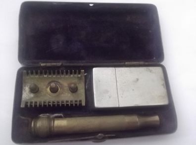 a  antique shaven kit in a brass box1st world war