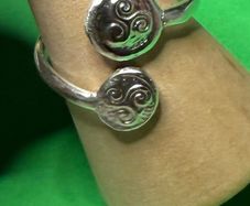 Hand made silver Celtic triskele adjustable ring. Size O plus or minus one size