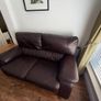 2 seater Arnotts leather couch Image 4
