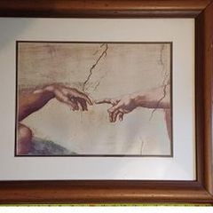 Framed print of Da Vinci's Creation of Adam most famous detail