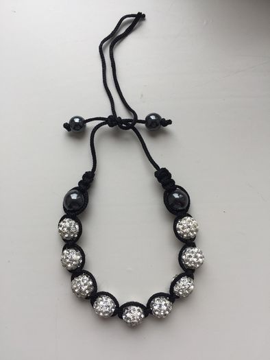 White & black beaded bracelet with diamonds