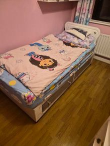 single bed frame and mattress