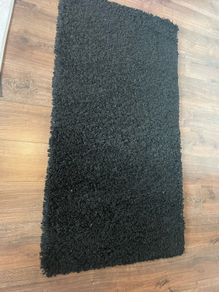 high pile black rug