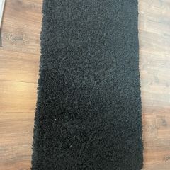 high pile black rug