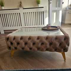 Velvet button-tufted coffee table with glass top