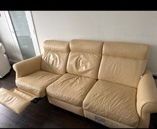 Free - Leather recliner sofa in cream-available end April
