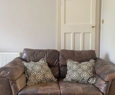 DFS leather two seater sofa / couch
