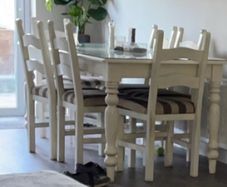 solid wood table with glass top