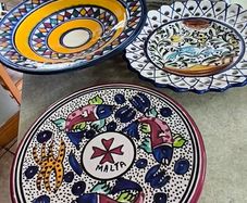 3 hanging wall plates -1- from Malta hand painted -2- from PORTGAL HAND PAINTED-3- FROM MAROCO - EACH IS 22.00 Euro.