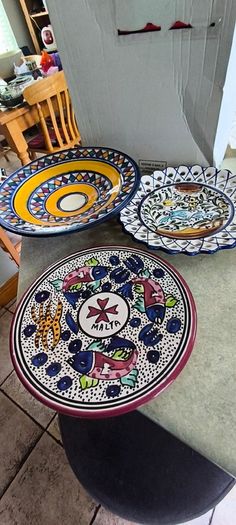 3 hanging wall plates -1- from Malta hand painted -2- from PORTGAL HAND PAINTED-3- FROM MAROCO - EACH IS 22.00 Euro.