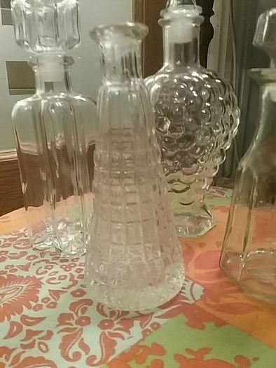 Four Glass Decanters with Stoppers