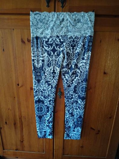 blue and white leggings with damask print with a white lace waistband. New never worn.
