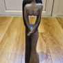 Sculpture of a couple standing Image 2
