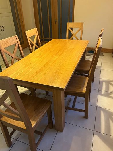 Solid oak dining table with 6 chairs