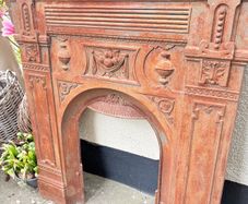 Vintage French cast iron rusted fire place surround