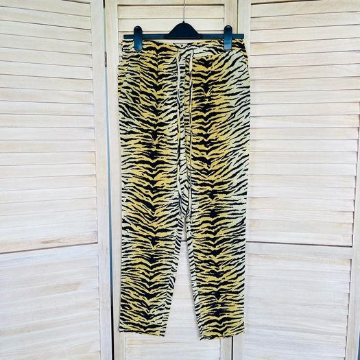 Tiger print trousers by Red Valentino