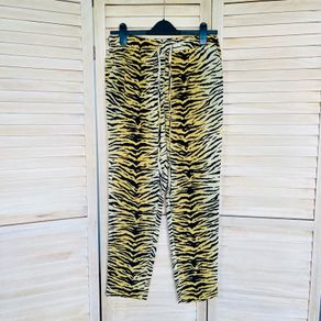 Tiger print trousers by Red Valentino