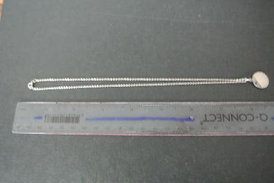 Silver Chain And Silver Disc.