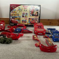 2x Disney Pixar Lightning McQueen change & race car and games