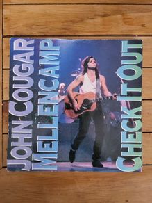 John Cougar Mellencamp Check It Out 7 inch Vinyl Single 1987 Mercury JCM 10