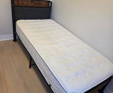 Single bed with mattress and topper