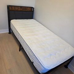 Single bed with mattress and topper