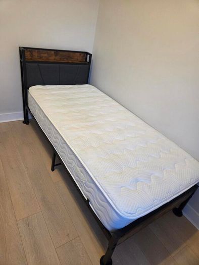 Single bed with mattress and topper