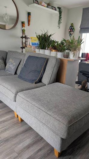 Gray fabric corner chase sofa with footstool