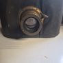 The object in the image is a vintage antique camera Image 4