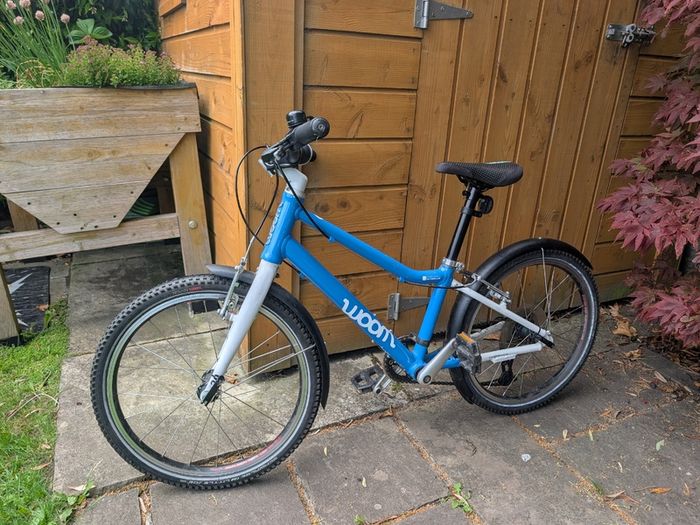 Woom 4 kids' bike in sky blue (for age 6-8)