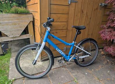 Woom 4 kids' bike in sky blue (for age 6-8)