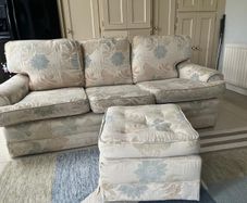 Three seater couch / sofa and matching footstool