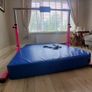 Gymnastics Bar and Mat Image 2