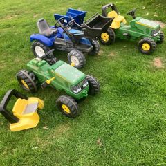 kids tractors and a trailer
