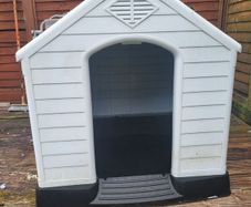 large dog bed for outside, never used but has been stored outside, just needs a hose down