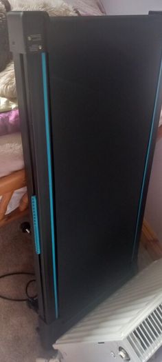 Treadmill for home with 33OlBS capacity 2 75 HP upgraded portable under desk running machine  with  magnet. REMOTE CONTROL,LED REPLAY. COLOUR BLACK-BLUE .HARDLY USED BOUGHT FEW  MONTHS AGO.