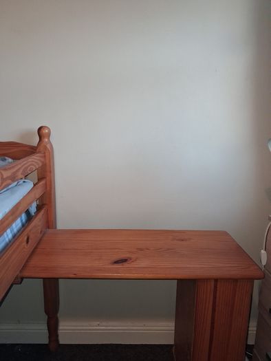 Pine mid-sleeper bed with storage shelf