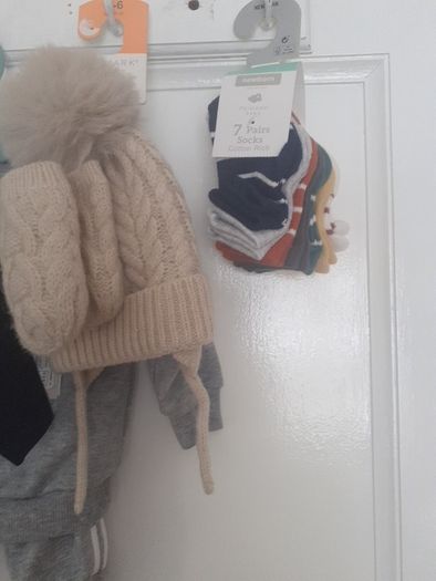 New baby boy bundle with tags .Consists of Addidas tracksuit . Name it top .Hat and gloves .pack of 7 pair socks .2 pair of rattle socks and free sunhat new  and green cable jumper all new  17 euro the lot