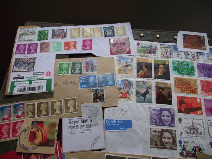 A box with collection of stamps from Great Britain