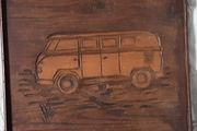 side on carved wooden vw camper