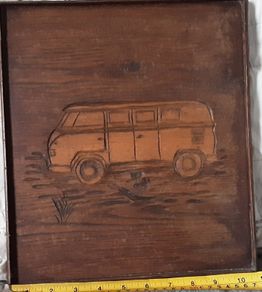 side on carved wooden vw camper